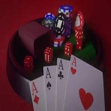 Live casino dealer room with baccarat and roulette tables
